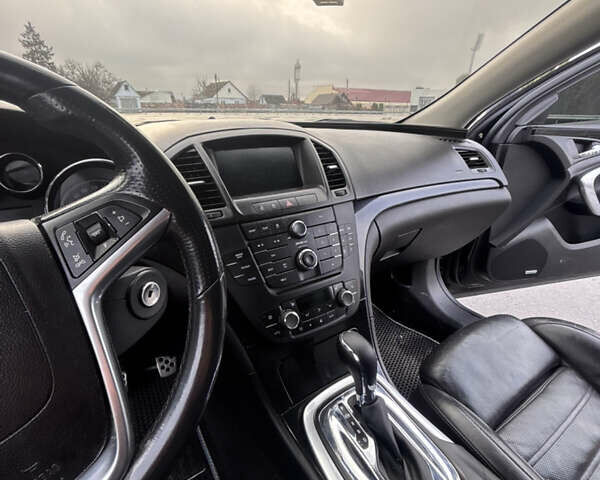 Черный Опель Инсигния, объемом двигателя 2 л и пробегом 265 тыс. км за 7250 $, фото 4 на Automoto.ua