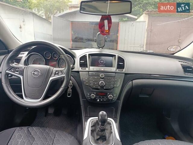 Черный Опель Инсигния, объемом двигателя 1.96 л и пробегом 236 тыс. км за 7500 $, фото 5 на Automoto.ua