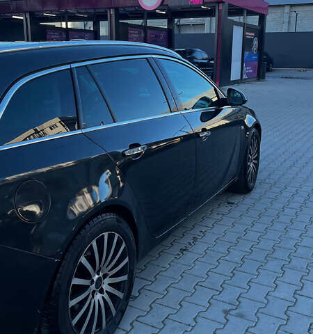 Чорний Опель Інсігнія, об'ємом двигуна 1.96 л та пробігом 374 тис. км за 6500 $, фото 6 на Automoto.ua