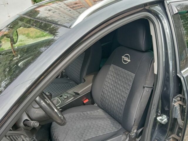 Чорний Опель Інсігнія, об'ємом двигуна 2 л та пробігом 236 тис. км за 7500 $, фото 7 на Automoto.ua