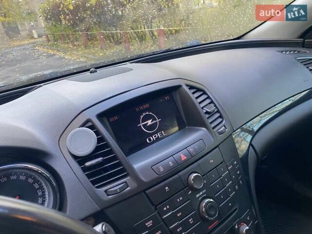 Черный Опель Инсигния, объемом двигателя 1.96 л и пробегом 208 тыс. км за 7750 $, фото 66 на Automoto.ua