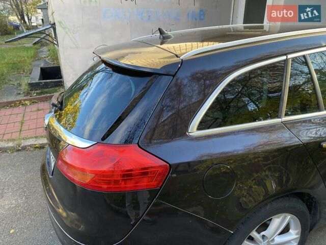 Черный Опель Инсигния, объемом двигателя 1.96 л и пробегом 208 тыс. км за 7750 $, фото 14 на Automoto.ua