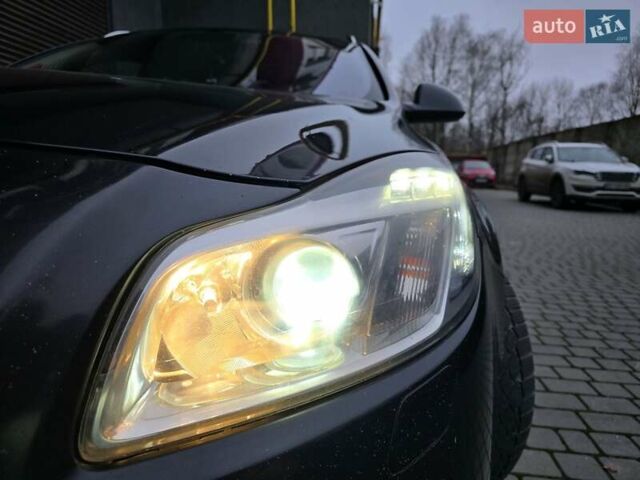 Чорний Опель Інсігнія, об'ємом двигуна 1.96 л та пробігом 412 тис. км за 6950 $, фото 1 на Automoto.ua