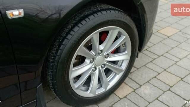 Черный Опель Инсигния, объемом двигателя 1.96 л и пробегом 238 тыс. км за 8900 $, фото 2 на Automoto.ua