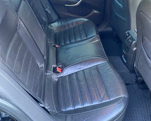 Черный Опель Инсигния, объемом двигателя 1.96 л и пробегом 208 тыс. км за 7750 $, фото 33 на Automoto.ua