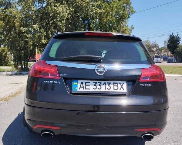 Чорний Опель Інсігнія, об'ємом двигуна 2 л та пробігом 211 тис. км за 9900 $, фото 6 на Automoto.ua