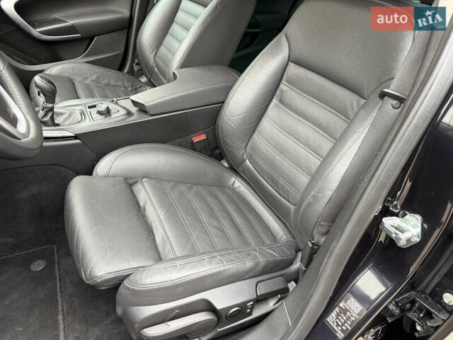 Черный Опель Инсигния, объемом двигателя 1.6 л и пробегом 204 тыс. км за 8300 $, фото 26 на Automoto.ua