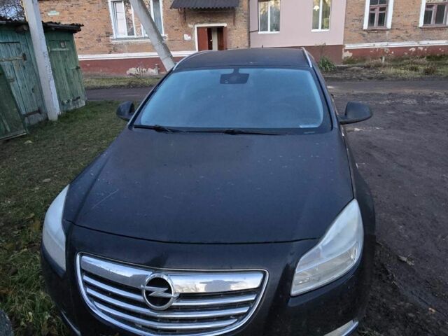 Черный Опель Инсигния, объемом двигателя 2 л и пробегом 305 тыс. км за 2800 $, фото 1 на Automoto.ua