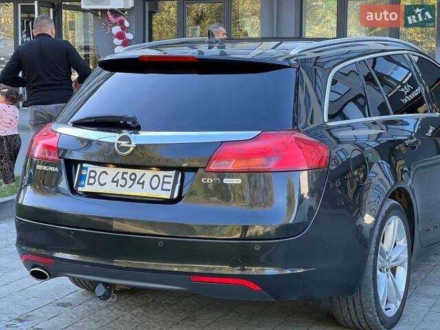 Чорний Опель Інсігнія, об'ємом двигуна 1.96 л та пробігом 370 тис. км за 5500 $, фото 11 на Automoto.ua