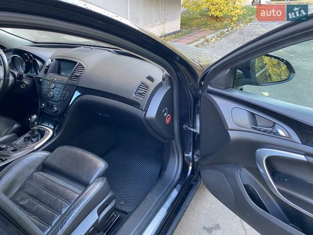 Черный Опель Инсигния, объемом двигателя 1.96 л и пробегом 208 тыс. км за 7750 $, фото 45 на Automoto.ua