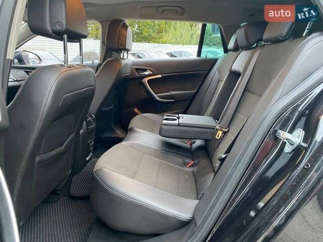 Черный Опель Инсигния, объемом двигателя 1.96 л и пробегом 304 тыс. км за 6990 $, фото 9 на Automoto.ua