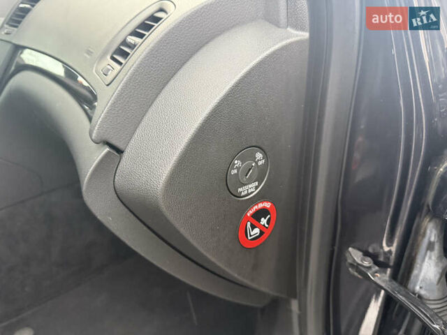 Чорний Опель Інсігнія, об'ємом двигуна 1.6 л та пробігом 204 тис. км за 8000 $, фото 38 на Automoto.ua