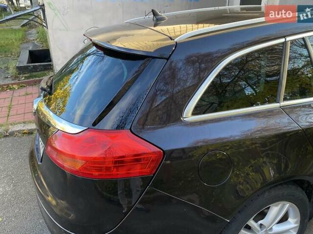 Черный Опель Инсигния, объемом двигателя 1.96 л и пробегом 208 тыс. км за 7750 $, фото 22 на Automoto.ua