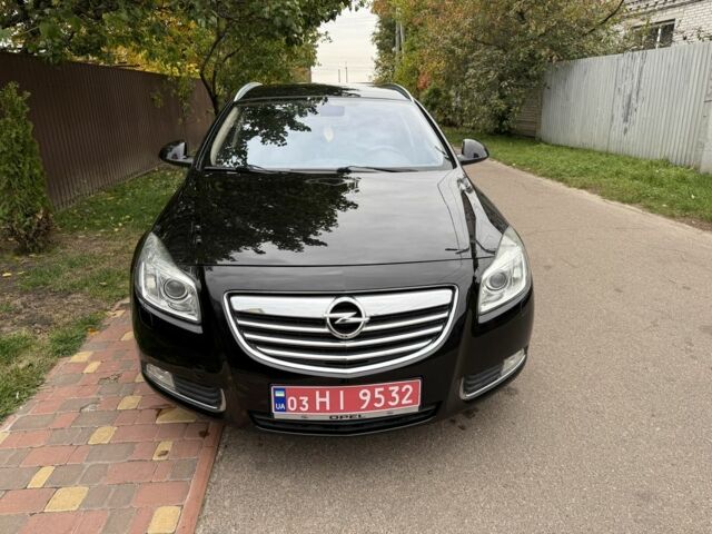 Черный Опель Инсигния, объемом двигателя 1.6 л и пробегом 204 тыс. км за 8300 $, фото 1 на Automoto.ua