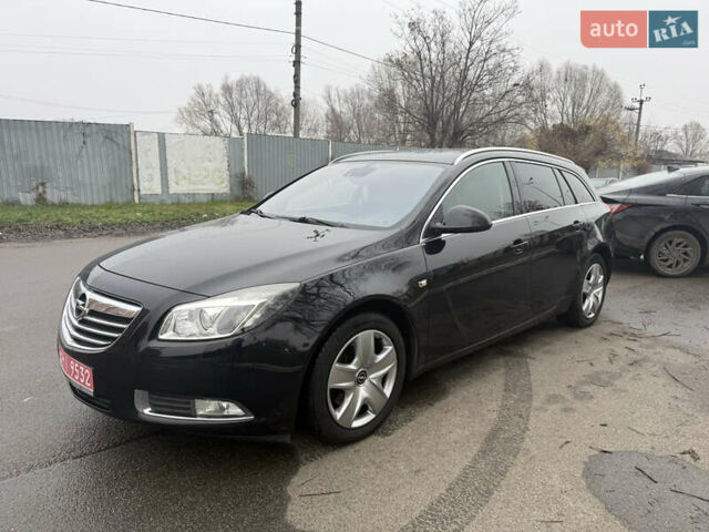 Чорний Опель Інсігнія, об'ємом двигуна 1.6 л та пробігом 204 тис. км за 8000 $, фото 2 на Automoto.ua