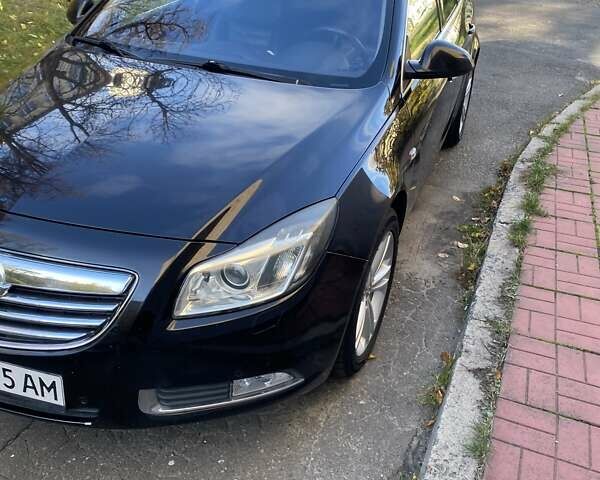 Черный Опель Инсигния, объемом двигателя 1.96 л и пробегом 208 тыс. км за 7750 $, фото 4 на Automoto.ua
