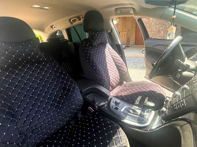 Черный Опель Инсигния, объемом двигателя 2 л и пробегом 259 тыс. км за 6200 $, фото 4 на Automoto.ua