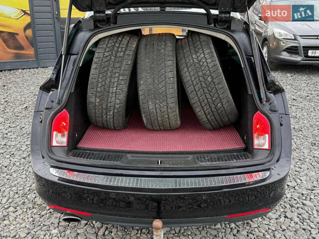 Черный Опель Инсигния, объемом двигателя 1.96 л и пробегом 242 тыс. км за 7600 $, фото 33 на Automoto.ua