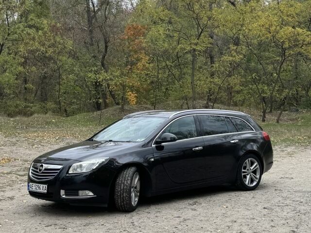 Черный Опель Инсигния, объемом двигателя 2 л и пробегом 275 тыс. км за 8500 $, фото 4 на Automoto.ua