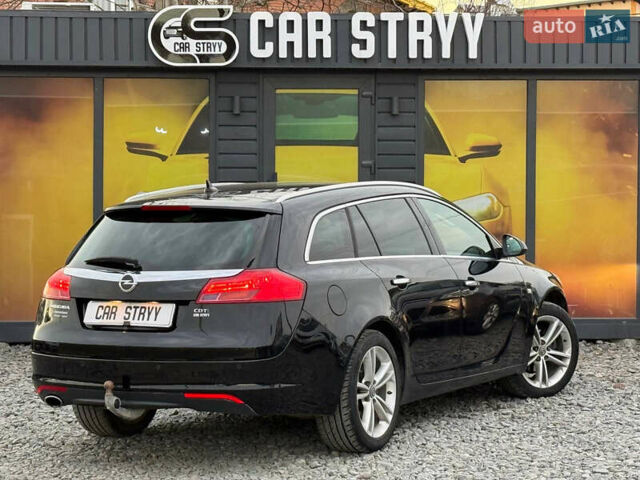 Черный Опель Инсигния, объемом двигателя 1.96 л и пробегом 242 тыс. км за 7600 $, фото 12 на Automoto.ua