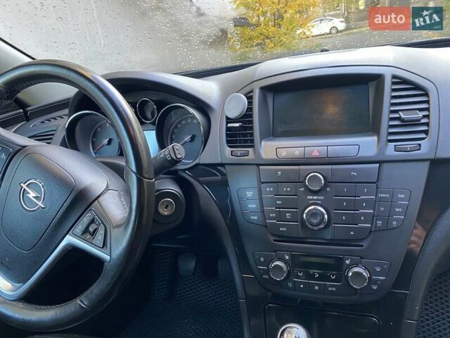 Черный Опель Инсигния, объемом двигателя 1.96 л и пробегом 208 тыс. км за 7750 $, фото 58 на Automoto.ua