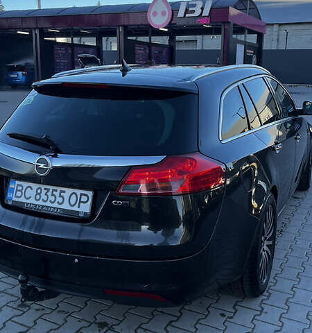 Опель Інсігнія 2009 у Львові на Automoto.ua Чорний Опель Інсігнія, об'ємом двигуна 1.96 л та пробігом 373 тис. км за 7300 $, фото 7 на Automoto.ua