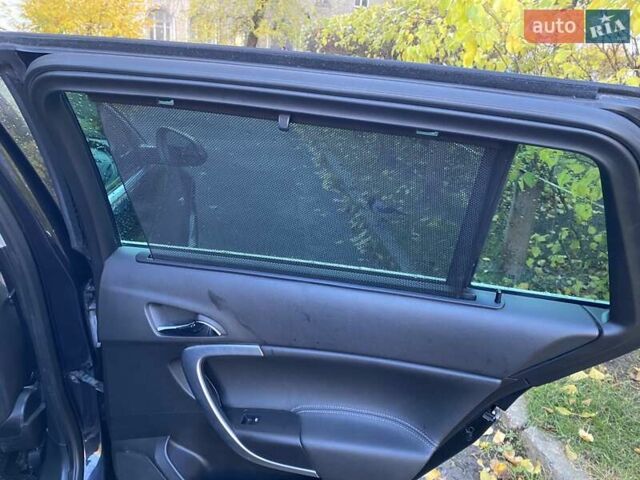 Черный Опель Инсигния, объемом двигателя 1.96 л и пробегом 208 тыс. км за 7750 $, фото 37 на Automoto.ua