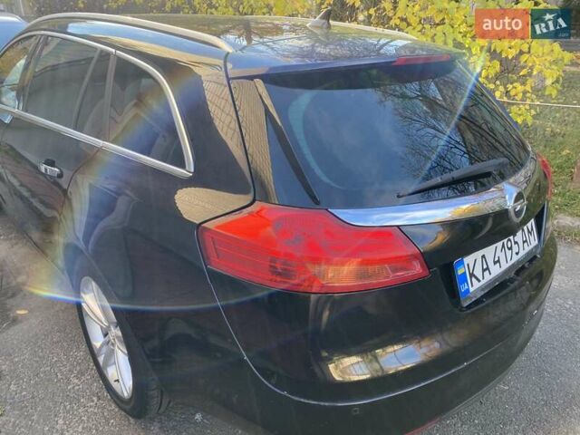 Черный Опель Инсигния, объемом двигателя 1.96 л и пробегом 208 тыс. км за 7750 $, фото 11 на Automoto.ua