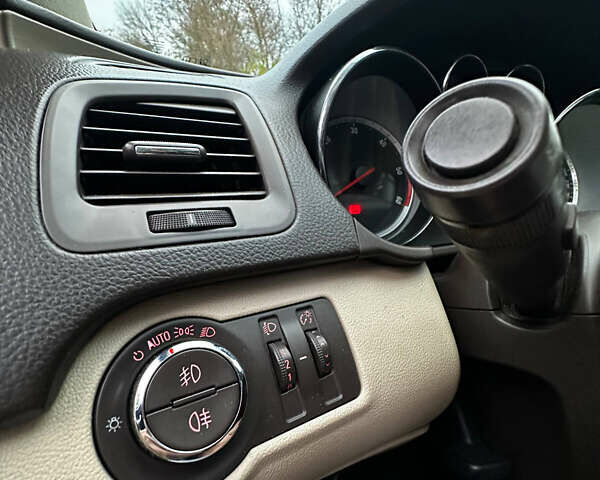 Черный Опель Инсигния, объемом двигателя 2 л и пробегом 266 тыс. км за 7600 $, фото 10 на Automoto.ua