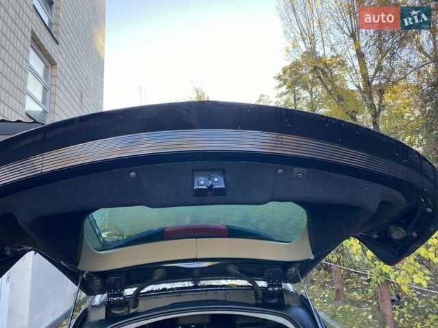 Черный Опель Инсигния, объемом двигателя 1.96 л и пробегом 208 тыс. км за 7750 $, фото 24 на Automoto.ua