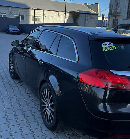 Опель Інсігнія 2009 у Львові на Automoto.ua Чорний Опель Інсігнія, об'ємом двигуна 1.96 л та пробігом 373 тис. км за 7300 $, фото 5 на Automoto.ua