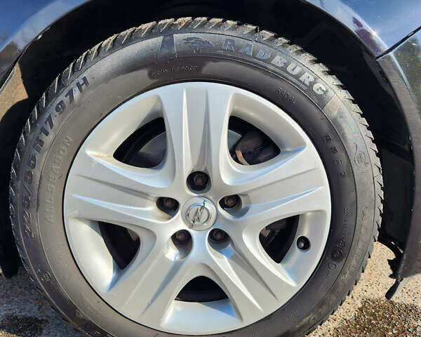 Черный Опель Инсигния, объемом двигателя 1.96 л и пробегом 301 тыс. км за 6000 $, фото 8 на Automoto.ua