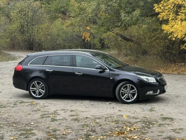 Черный Опель Инсигния, объемом двигателя 2 л и пробегом 275 тыс. км за 8500 $, фото 1 на Automoto.ua