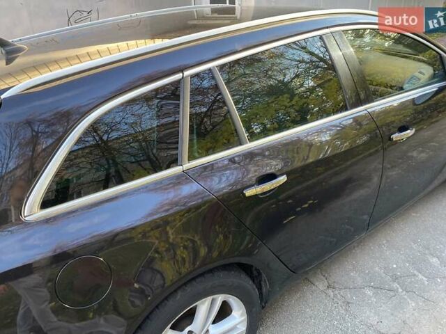 Черный Опель Инсигния, объемом двигателя 1.96 л и пробегом 208 тыс. км за 7750 $, фото 23 на Automoto.ua