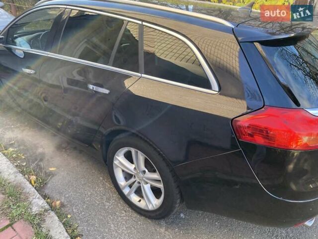 Черный Опель Инсигния, объемом двигателя 1.96 л и пробегом 208 тыс. км за 7750 $, фото 10 на Automoto.ua