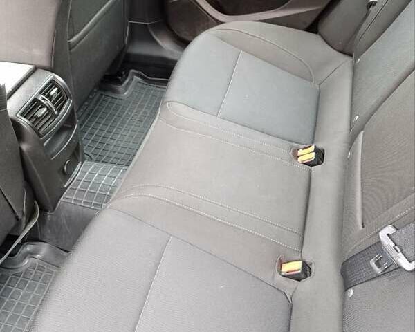 Черный Опель Инсигния, объемом двигателя 1.96 л и пробегом 177 тыс. км за 6500 $, фото 6 на Automoto.ua