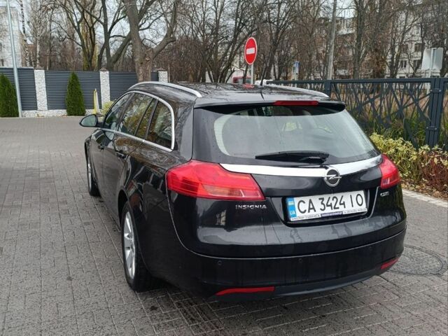 Чорний Опель Інсігнія, об'ємом двигуна 2 л та пробігом 175 тис. км за 6700 $, фото 4 на Automoto.ua