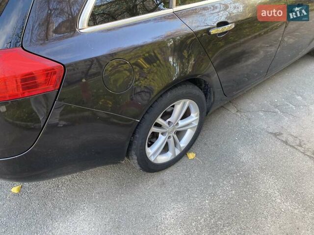 Черный Опель Инсигния, объемом двигателя 1.96 л и пробегом 208 тыс. км за 7750 $, фото 15 на Automoto.ua