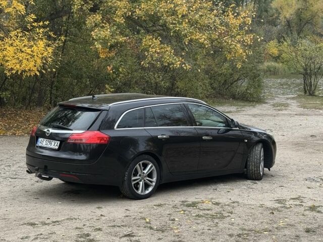 Черный Опель Инсигния, объемом двигателя 2 л и пробегом 275 тыс. км за 8500 $, фото 2 на Automoto.ua