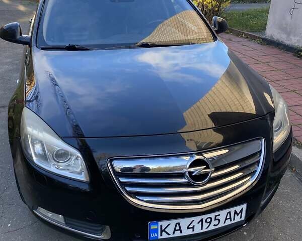 Черный Опель Инсигния, объемом двигателя 1.96 л и пробегом 208 тыс. км за 7750 $, фото 1 на Automoto.ua