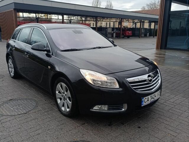 Чорний Опель Інсігнія, об'ємом двигуна 2 л та пробігом 175 тис. км за 6700 $, фото 1 на Automoto.ua