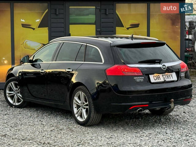 Черный Опель Инсигния, объемом двигателя 1.96 л и пробегом 242 тыс. км за 7600 $, фото 4 на Automoto.ua