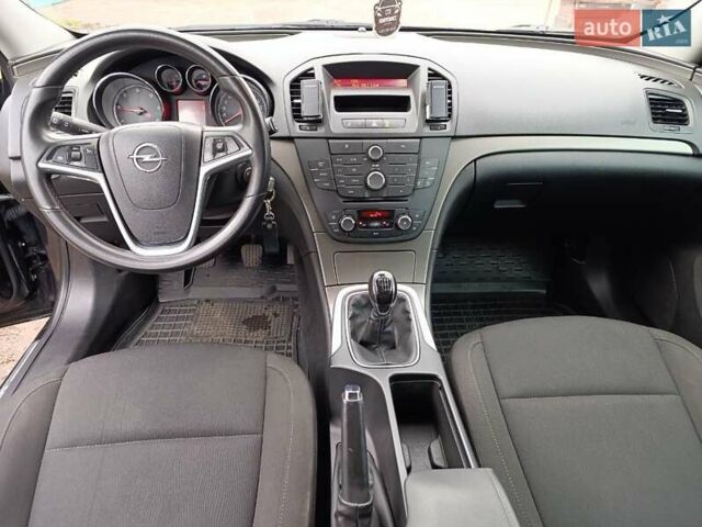 Черный Опель Инсигния, объемом двигателя 1.96 л и пробегом 177 тыс. км за 6500 $, фото 7 на Automoto.ua