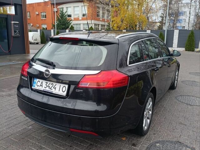Чорний Опель Інсігнія, об'ємом двигуна 2 л та пробігом 175 тис. км за 6700 $, фото 3 на Automoto.ua