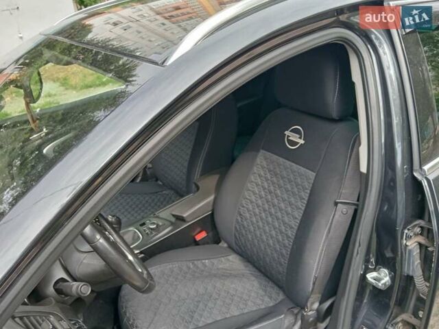 Черный Опель Инсигния, объемом двигателя 1.96 л и пробегом 236 тыс. км за 7500 $, фото 6 на Automoto.ua