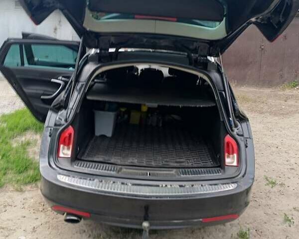 Черный Опель Инсигния, объемом двигателя 1.96 л и пробегом 236 тыс. км за 7500 $, фото 3 на Automoto.ua