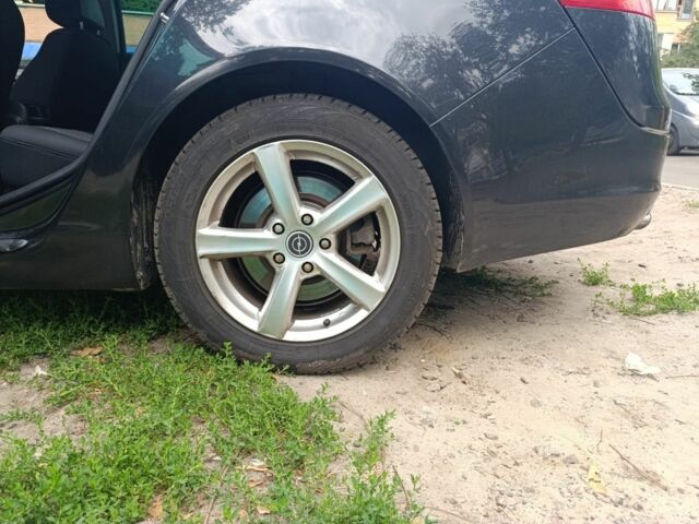 Чорний Опель Інсігнія, об'ємом двигуна 2 л та пробігом 236 тис. км за 7500 $, фото 3 на Automoto.ua