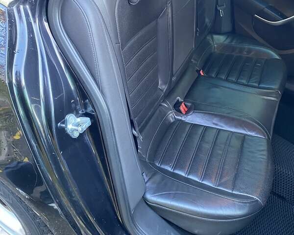 Черный Опель Инсигния, объемом двигателя 1.96 л и пробегом 208 тыс. км за 7750 $, фото 35 на Automoto.ua