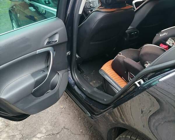 Черный Опель Инсигния, объемом двигателя 1.96 л и пробегом 248 тыс. км за 7800 $, фото 9 на Automoto.ua