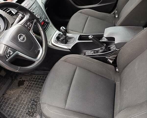 Черный Опель Инсигния, объемом двигателя 1.96 л и пробегом 177 тыс. км за 6500 $, фото 5 на Automoto.ua